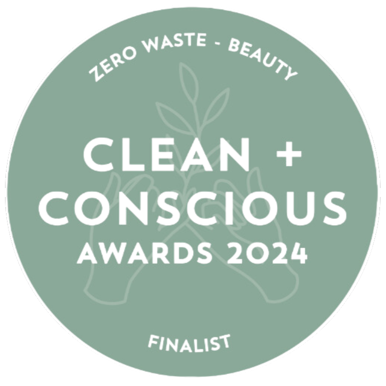 Green badge with 'Zero Waste Beauty Clean + Conscious Awards 2024 Finalist' text on a white background