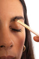 mascara being applied to brows - maca - medium - tan - cocoa