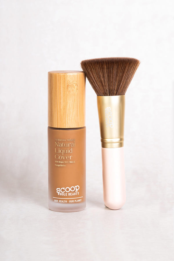 Scoop Whole Beauty natural liquid cover infused with hyaluronic acid in sustainable glass and bamboo packaging paired with ultra soft vegan foundation brush