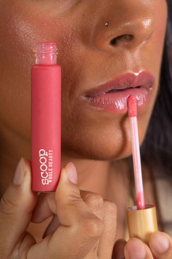 Scoop Whole Beauty natural, non toxic lipgloss in sustainable glass and bamboo packaging- pink pitaya