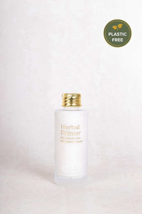 Scoop Whole Beauty natural herbal primer with witch hazel, displayed in the sustainable refill glass bottle