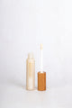 Scoop Whole Beauty natural, non toxic lipgloss in sustainable glass and bamboo packaging in shade clear - maca - medium - tan - cocoa