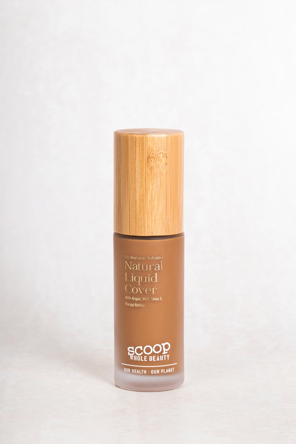 Scoop Whole Beauty light liquid cover foundation with pure minerals and hydrating HLA in sustainable, refillable, glass and bamboo bottle