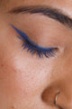 mud cake mascara in the shade ocean blue - applied as a winged eyeliner and mascara