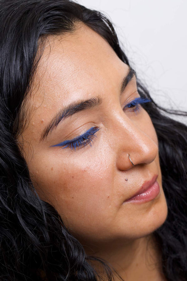 mud cake mascara in the shade ocean blue - applied as a winged eyeliner and mascara