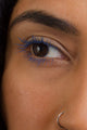 Scoop Whole Beauty model wears the ocean blue mascara shade -a natural, non toxic, mud cake mascara on lashes 