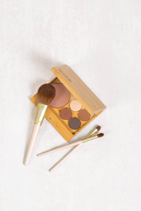 Scoop Whole Beauty sustainable bamboo large multi palette with refillable natural pressed powders and balms paired with our vegan brushes 