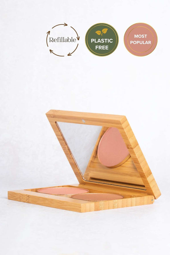 bamboo palette with magnets filled with a pressed blusher and bronzer in gold aluminium plates and large mirror on the underside.