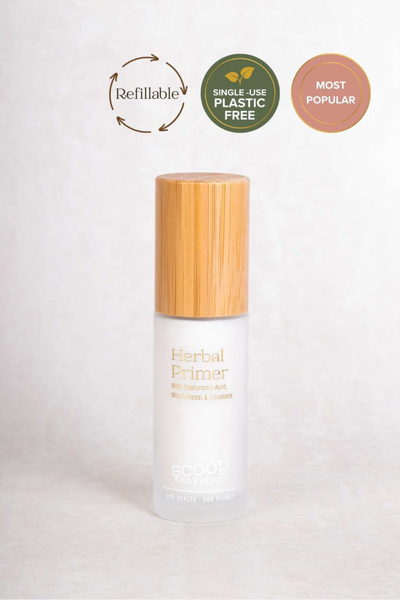 Scoop Whole Beauty natural herbal primer with witch hazel, displayed in refillable, sustainable, glass and bamboo bottle. Skin barrier protection for long lasting make up effect
