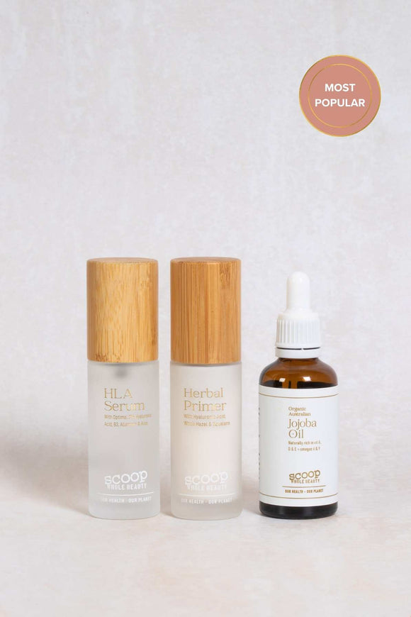 Scoop Whole Beauty skin glow trio of HLA serum, herbal primer and organic jojoba oil all in sustainable refillable packaging.