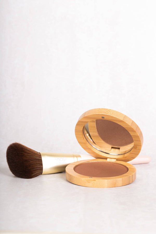 Scoop Whole Beauty ultra soft vegan angled brush paired with natural mineral bronzer in sustainable refillable bamboo compact 